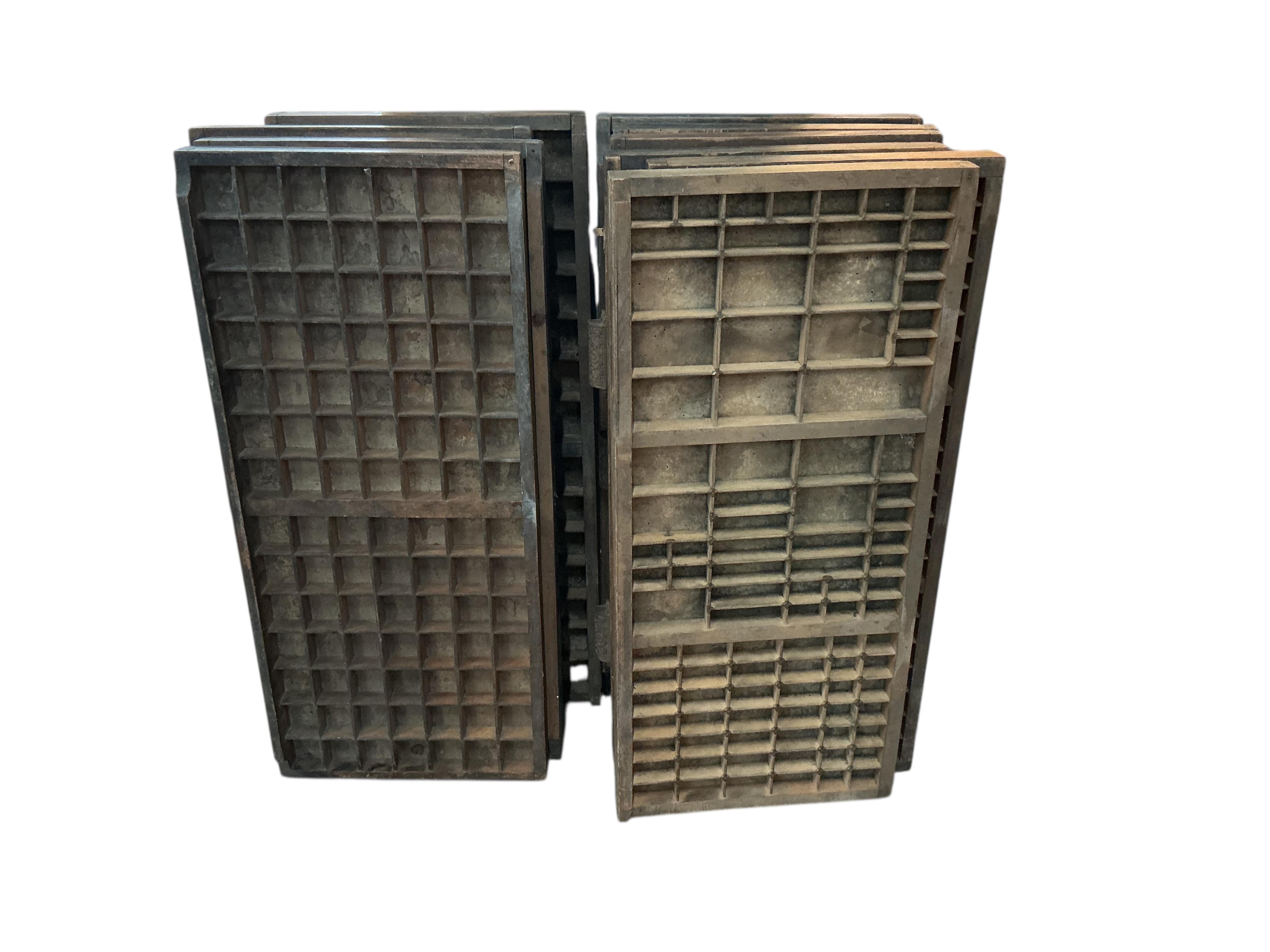 Ten printer's block trays, each width 37cm, height 84cm